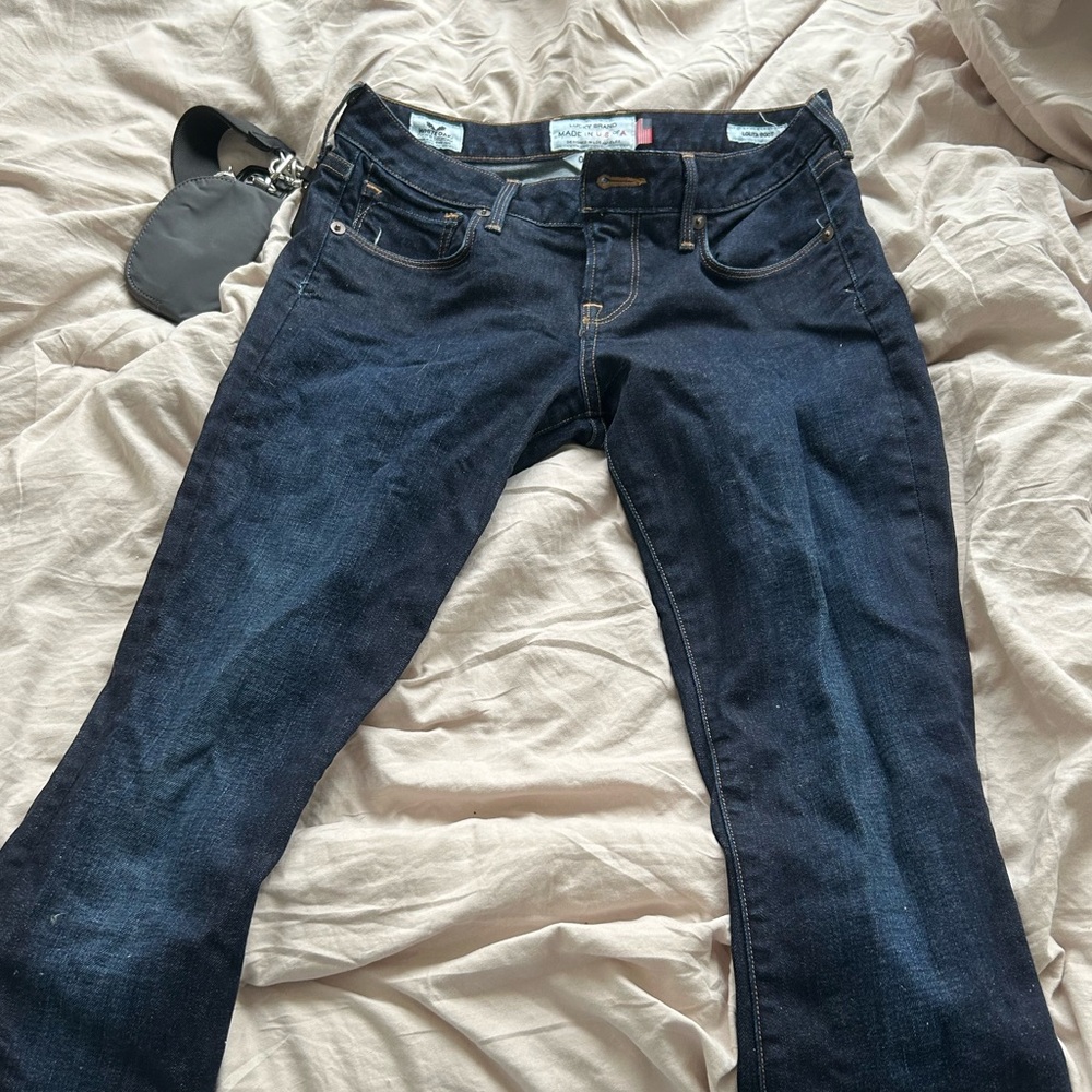 dark low rise lucky denim jeans